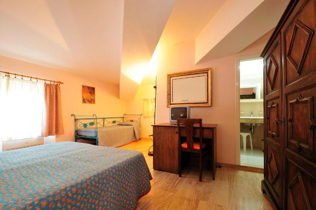 Hotel Villa Campana Cala Liberotto Ruang foto