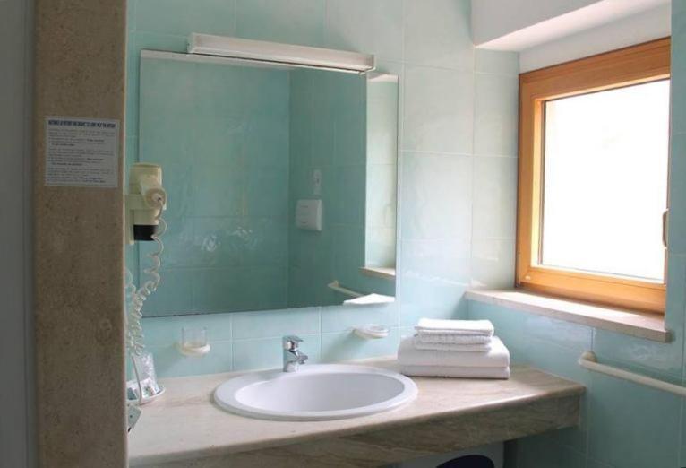 Hotel Villa Campana Cala Liberotto Bagian luar foto