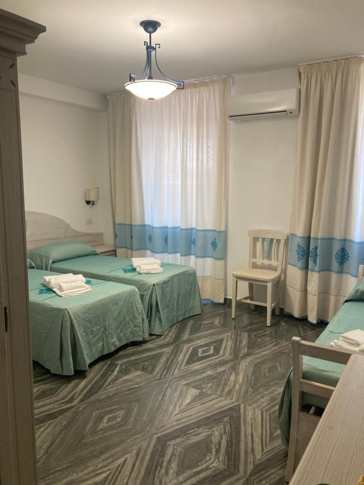 Hotel Villa Campana Cala Liberotto Bagian luar foto